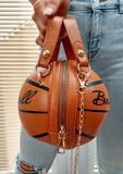 Brown Basketball shaped zip up bag